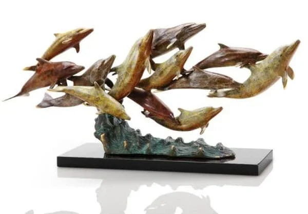 Dolphin Swimming in School Sculpture