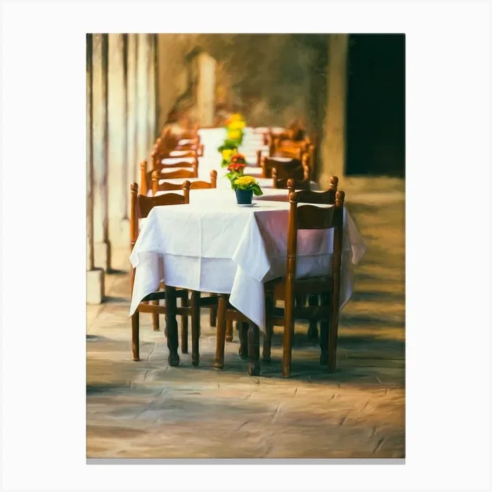 The Empty Tables Canvas Print by Paul J Bucknall